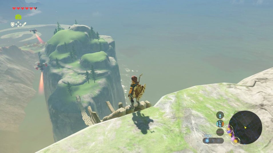 Breath of the Wild: Link steht am Beginn einer schockierend hohen, schmalen Brücke zu einer Felsinsel