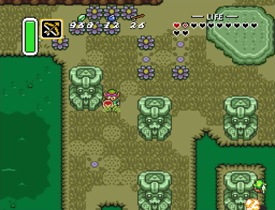 Screenshot aus A Link to the Past: Link läuft zwischen alten Monumenten herum