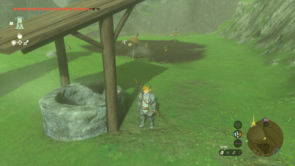 Screenshot aus Tears of the Kingdom: Link steht neben einem Brunnen