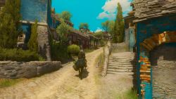 Eine Straße nahe der Hauptstadt Blood and Wine - Bunte Gebäude