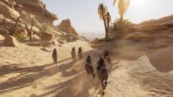Bayek und einige ägyptische Einheimische, die gegen die Griechen rebellieren wollen. Sieht aus wie aus einer Filmsequenz, ist aber Spielgrafik Assassins Creed Origins | Rebellen